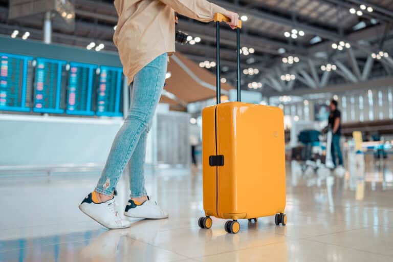 Woman travelling with luggage